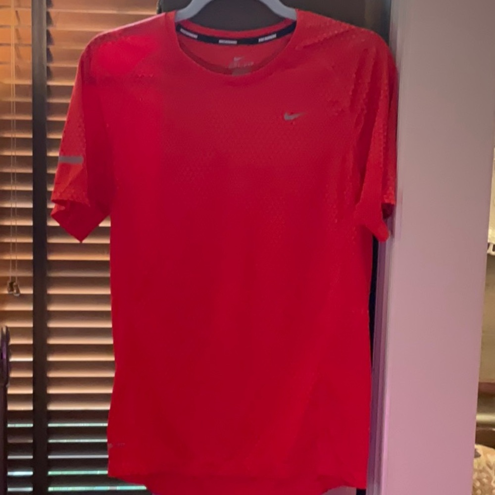 NIKE running t.  Dry Fit, as new, fabulous color and pattern.  Mint.